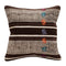 Decorative pillow with brown, black, and white pattern 
