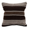 Striped pillow with black, brown, and white pattern