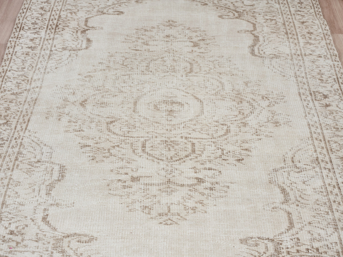 5'5" x 8'9" Beige Vintage Turkish Area Rug