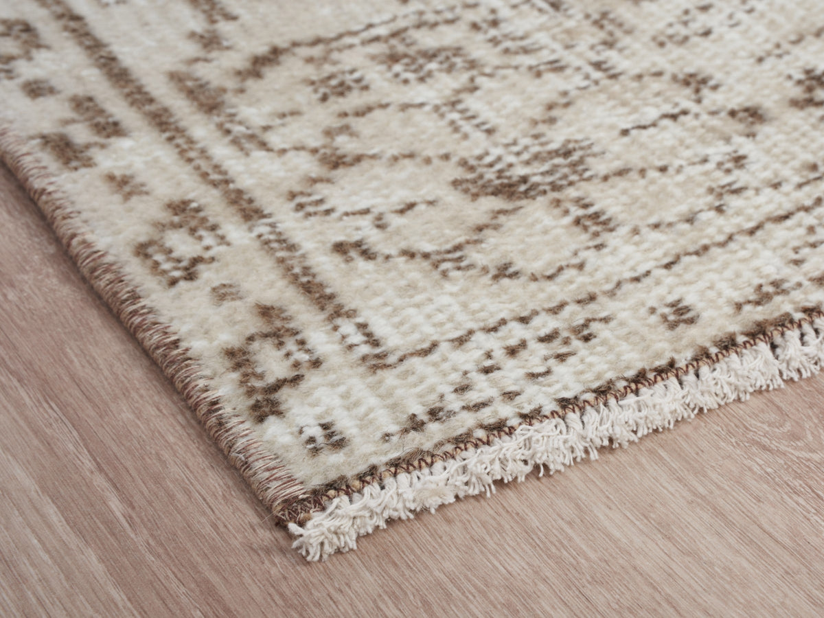 5'5" x 8'9" Beige Vintage Turkish Area Rug