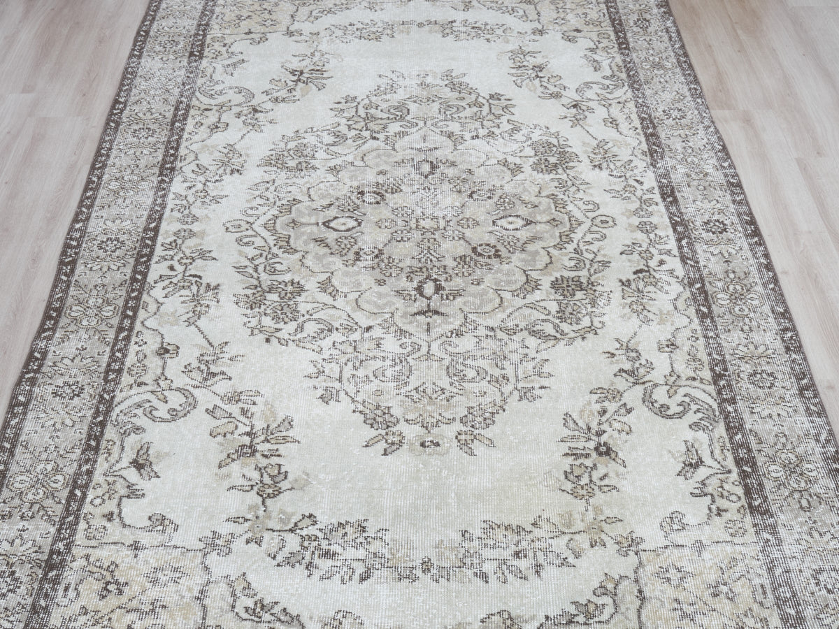 5'7" x 10'6" Neutral Vintage Turkish Area Rug