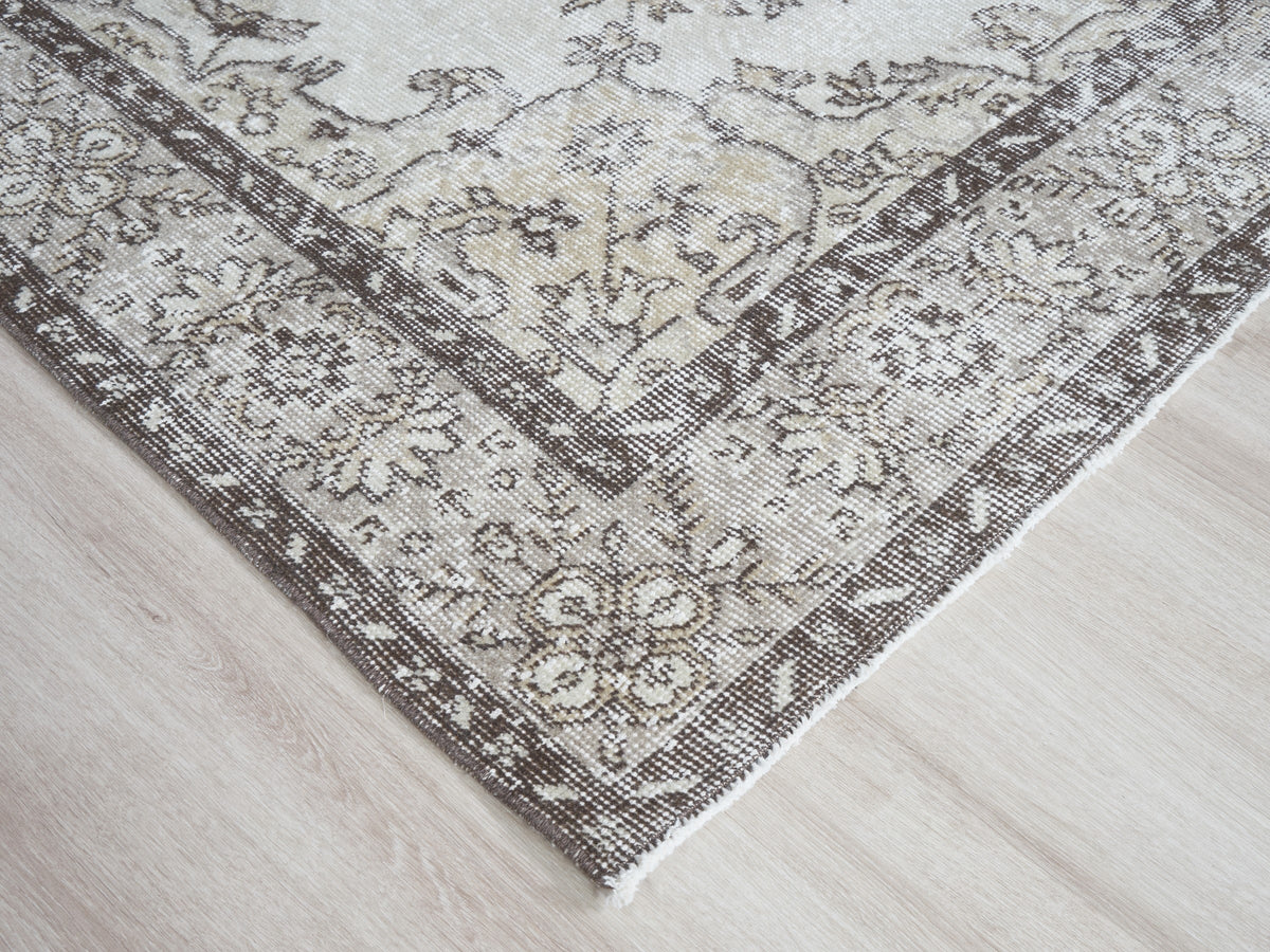 5'7" x 10'6" Neutral Vintage Turkish Area Rug