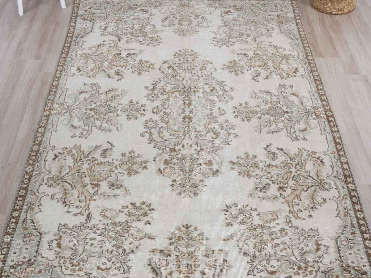 5'5" x 9'7" Neutral Vintage Turkish Area Rug