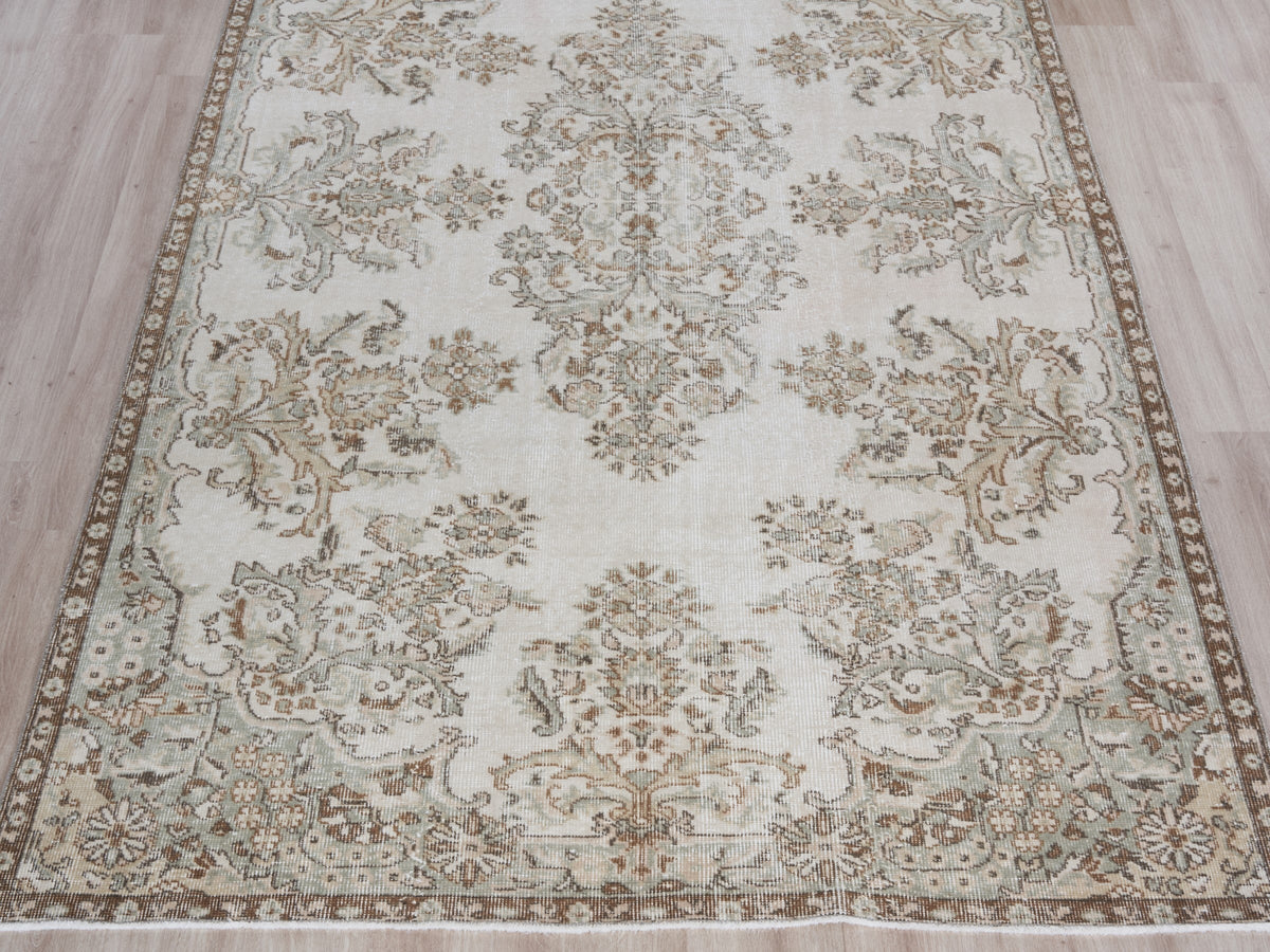 5'5" x 9'7" Neutral Vintage Turkish Area Rug