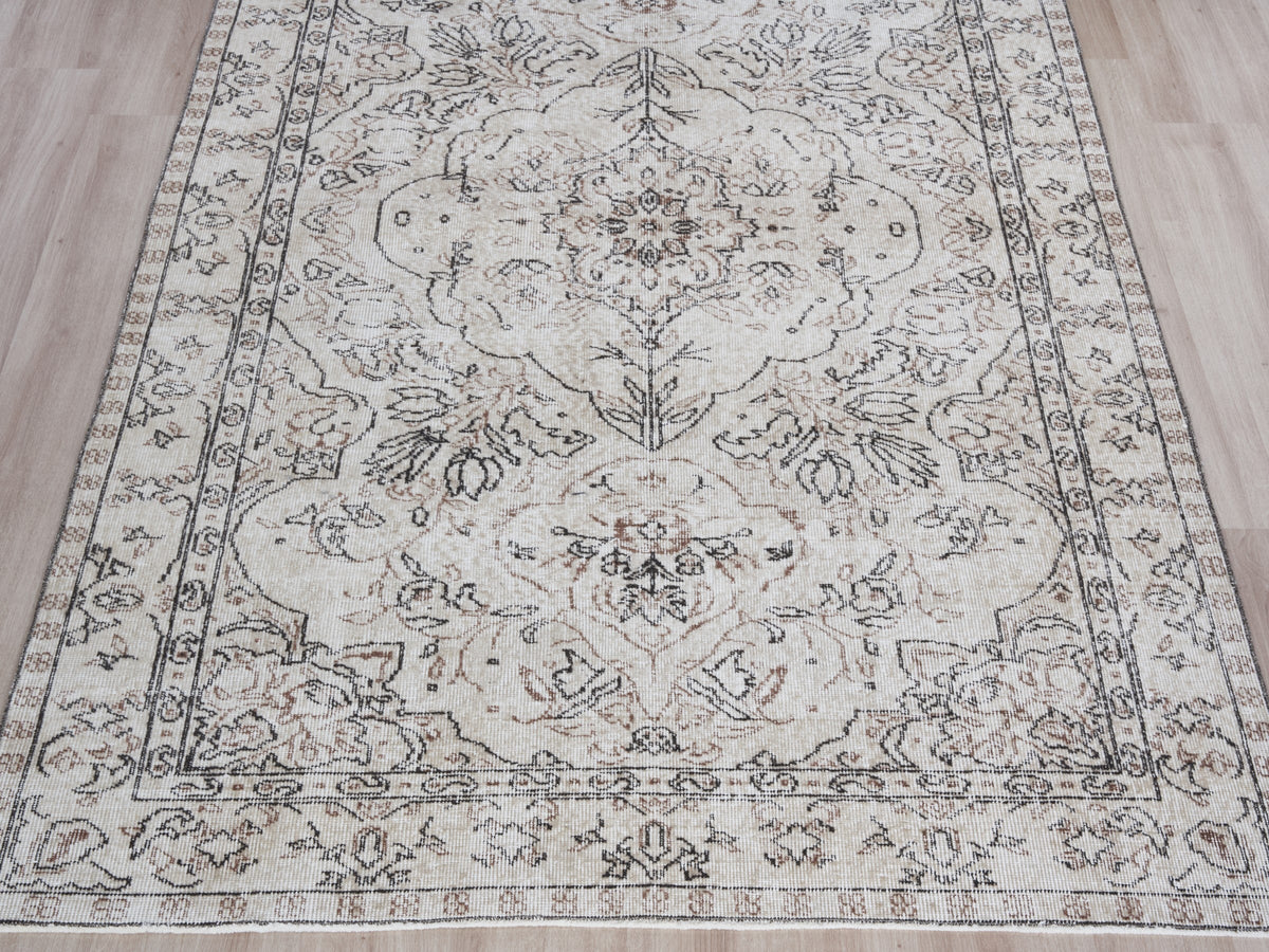 5'5" x 8'7" Neutral Vintage Turkish Area Rug