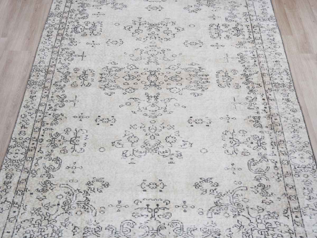 5'4" x 8'10" Neutral Vintage Turkish Area Rug