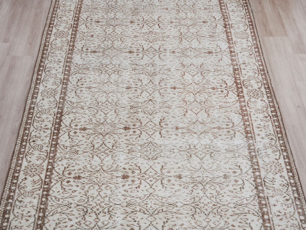 4'11" x 8'6" Neutral Vintage Turkish Area Rug