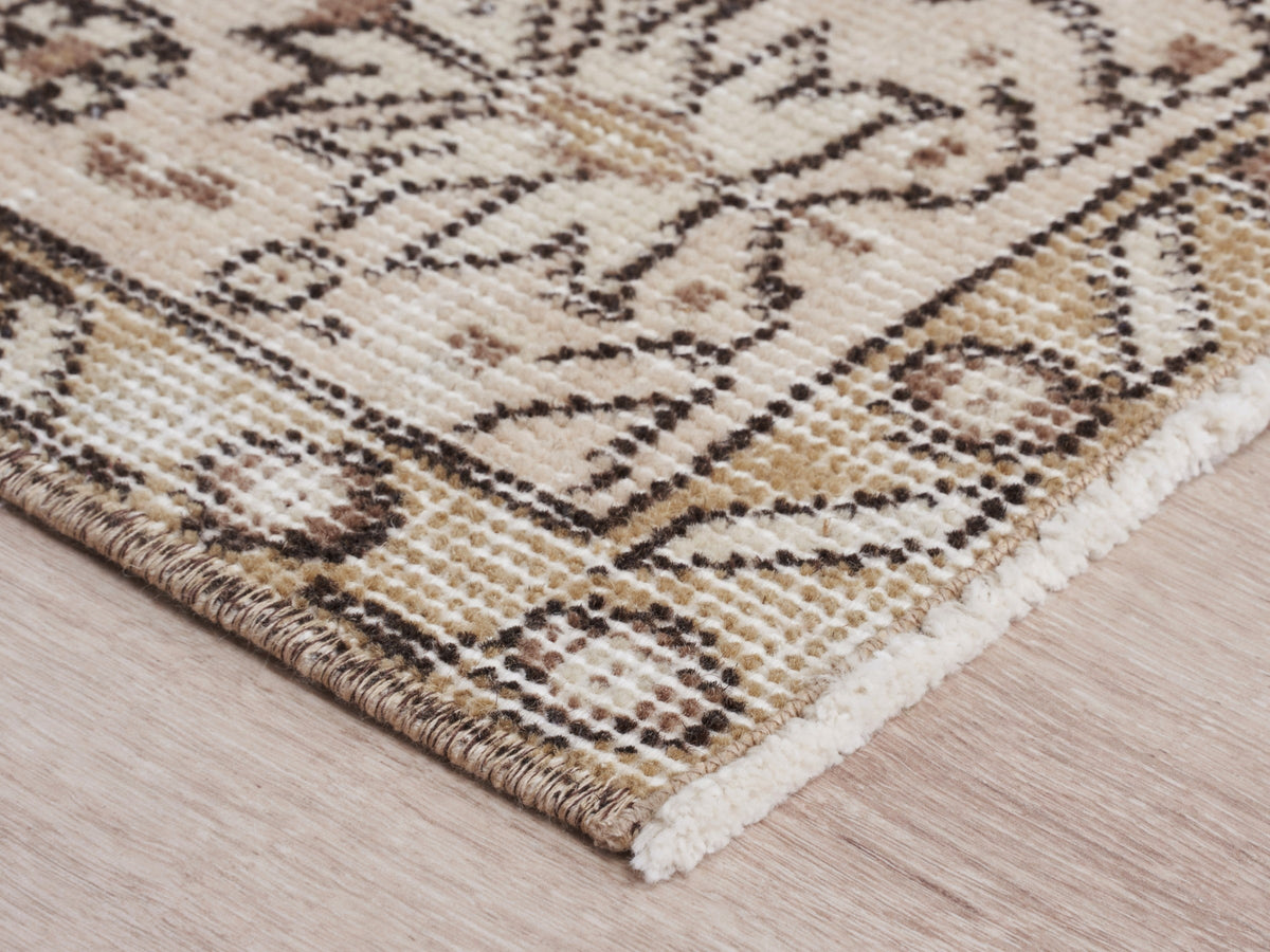 4'8" x 8'7" Beige Vintage Turkish Area Rug