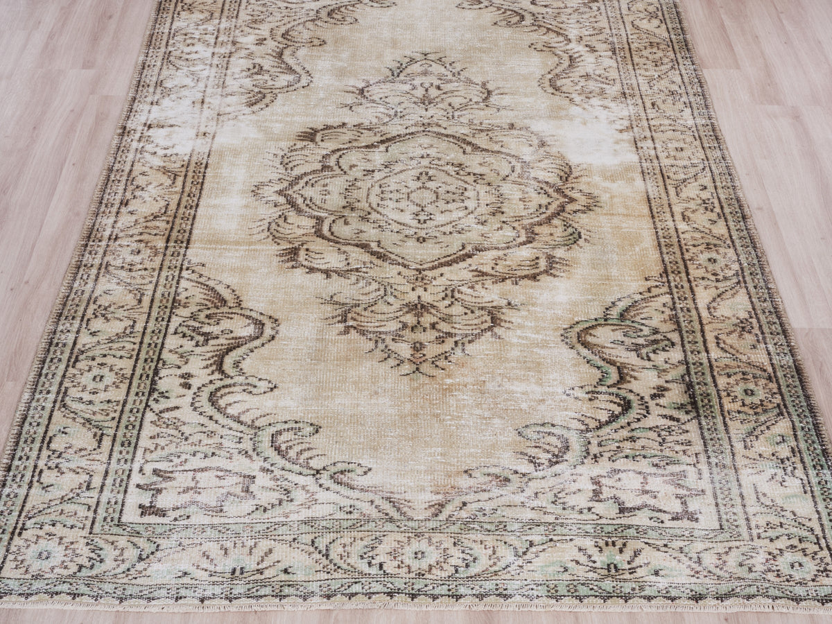 5'7" x 9'1" Beige Vintage Turkish Area Rug