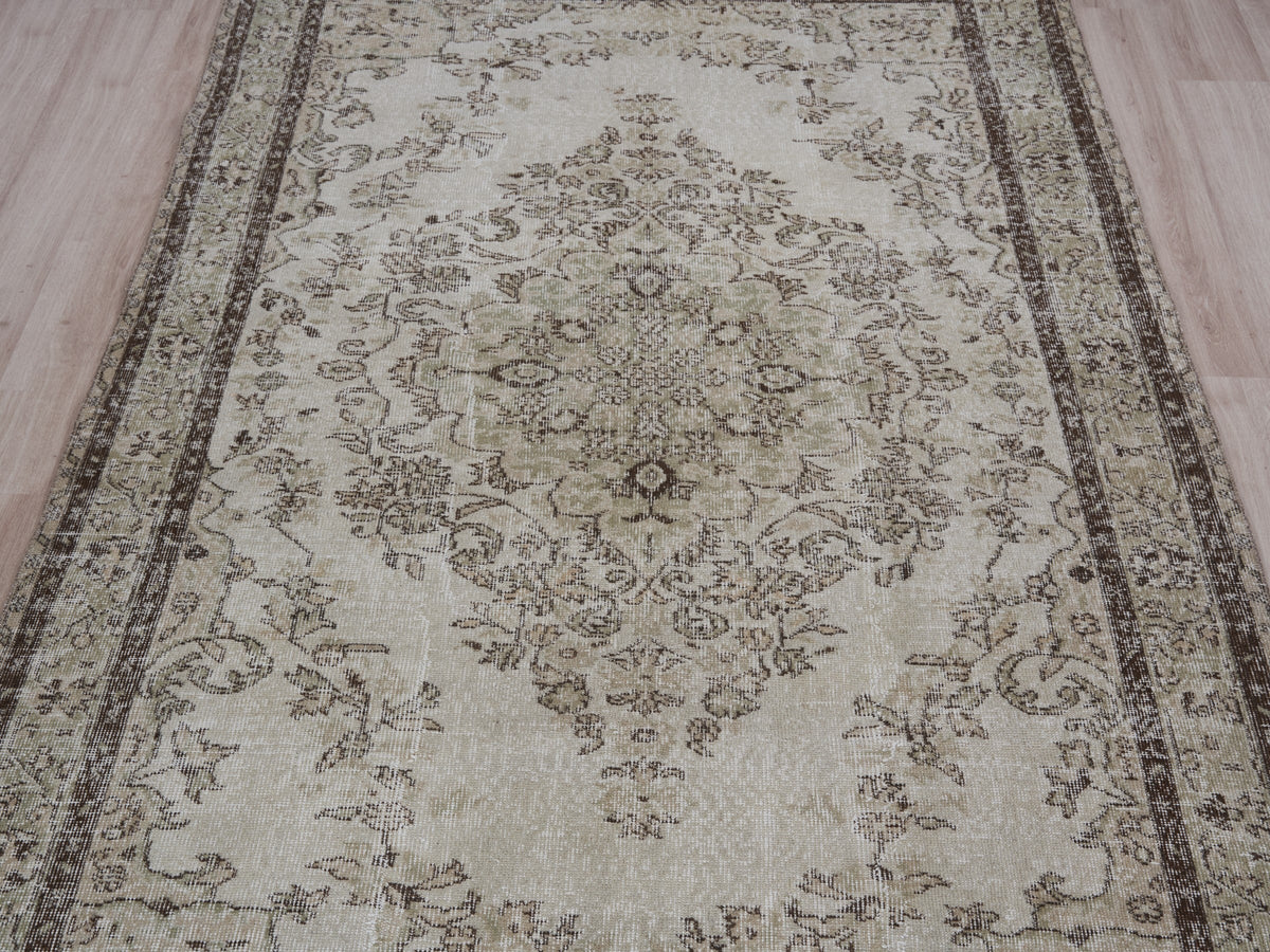 5'7" x 9'9" Neutral Vintage Turkish Rug