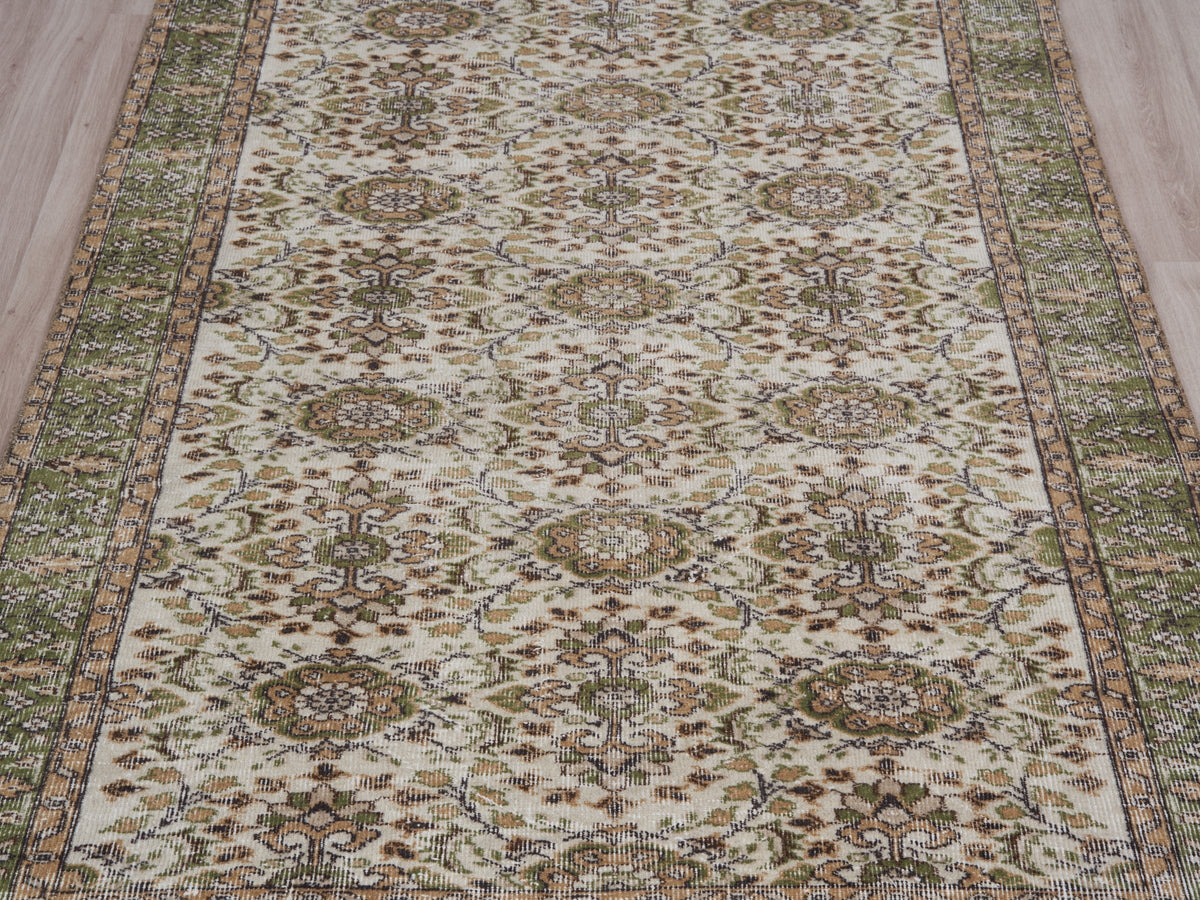 4'11" x 8'7" Hand-Knotted Vintage Turkish Area Rug