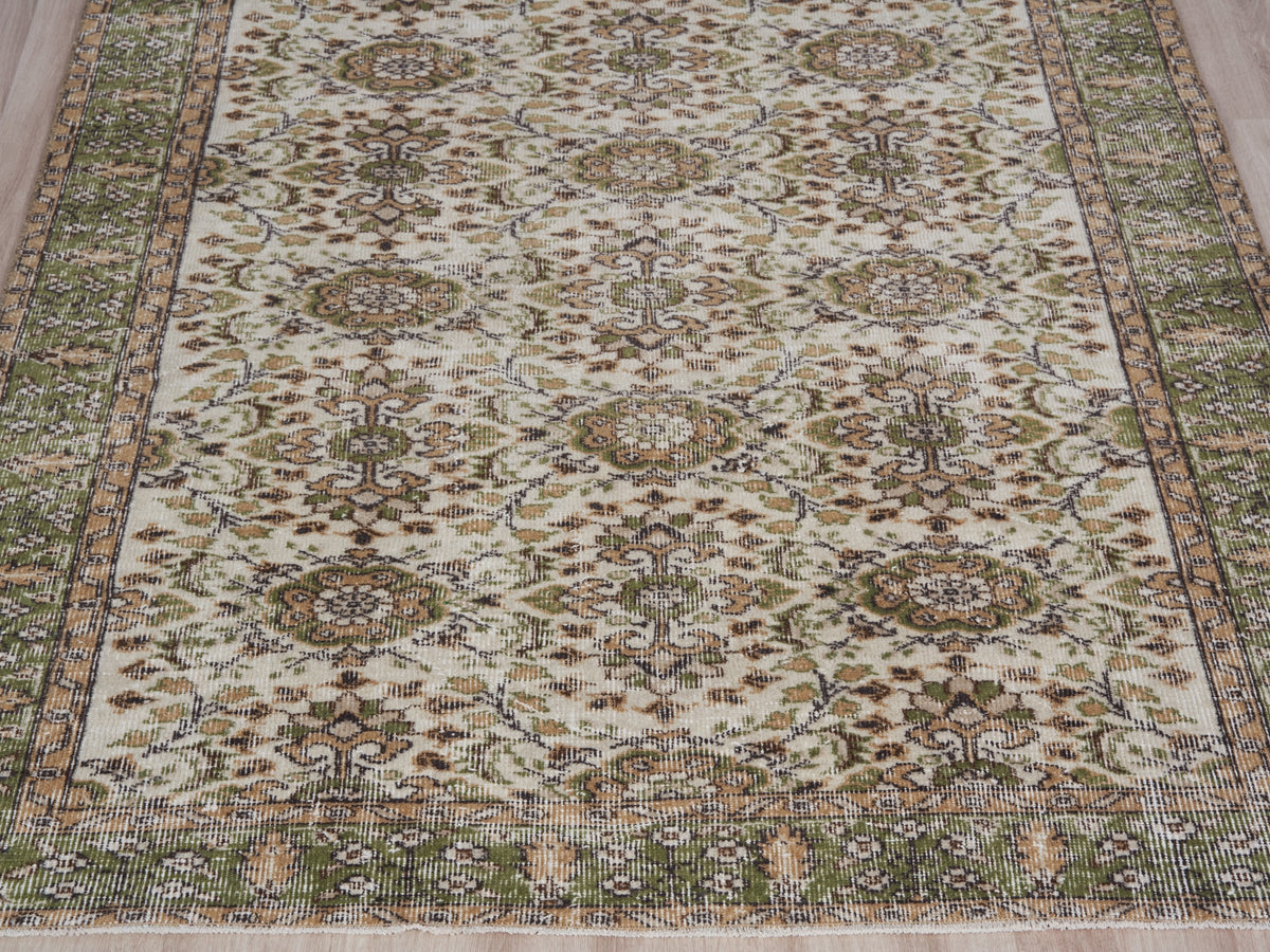 4'11" x 8'7" Hand-Knotted Vintage Turkish Area Rug