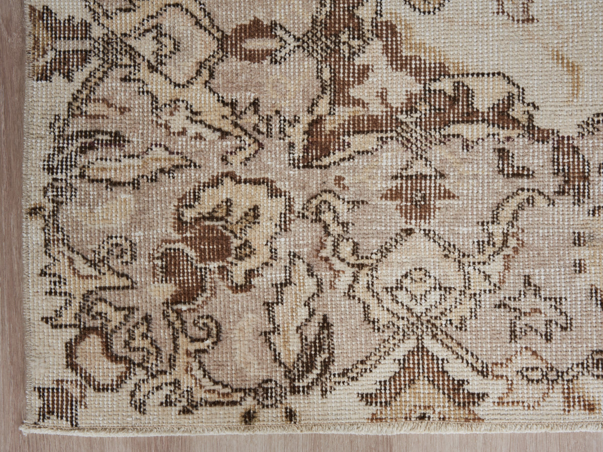 5'4" x 9' Beige Handwoven Vintage Area Rug