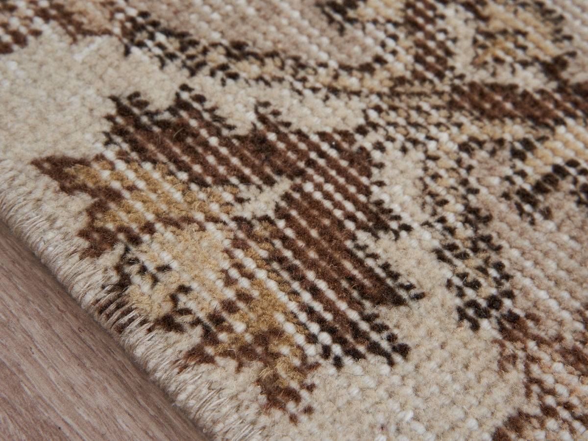 5'4" x 9' Beige Handwoven Vintage Area Rug