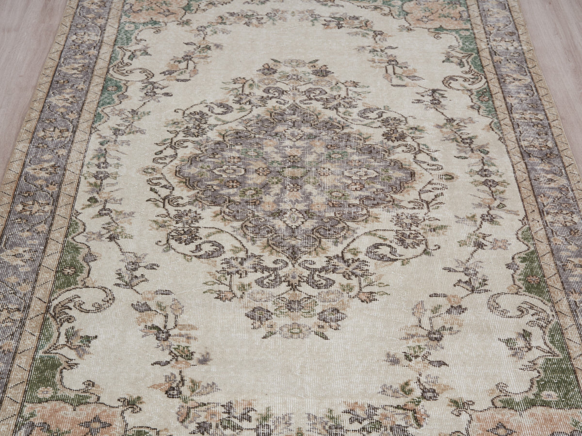 5'6" x 9'1" Neutral Vintage Turkish Area Rug