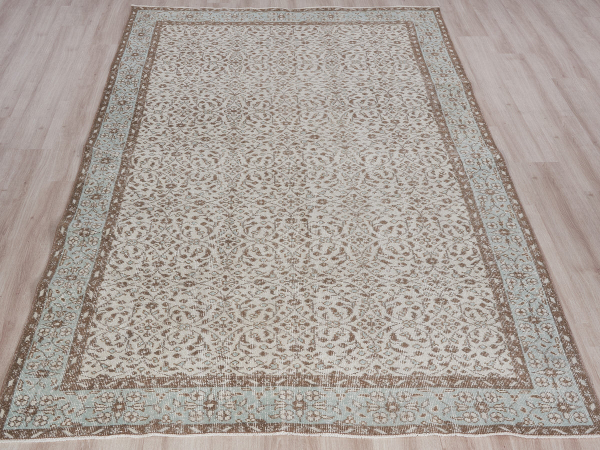 5'9" x 9'6" Neutral Vintage Turkish Area Rug