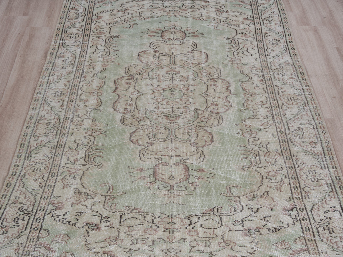 5'6" x 9' Vintage Turkish Area Rug