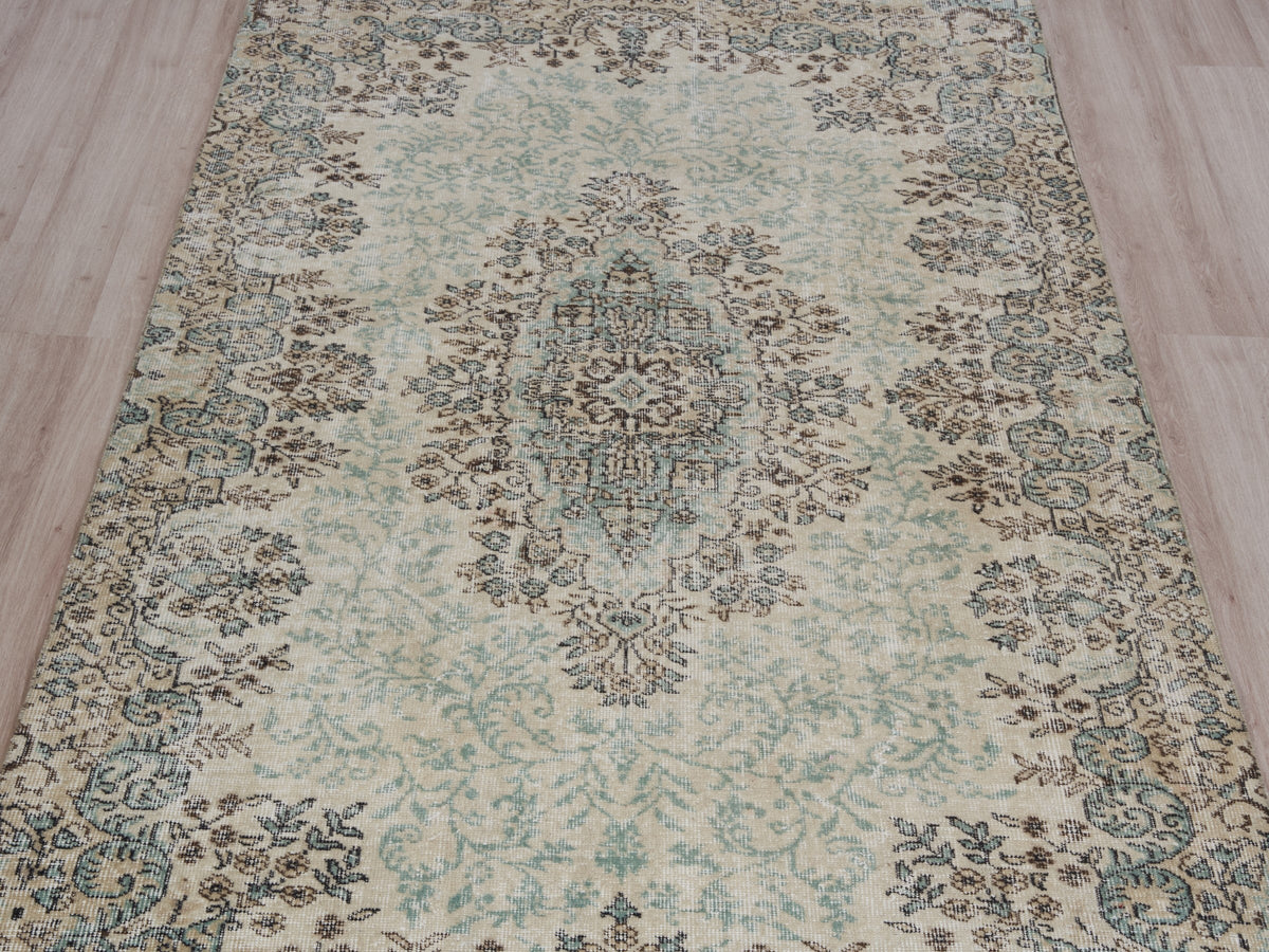 5'5" x 9'5" Neutral Vintage Turkish Area Rug