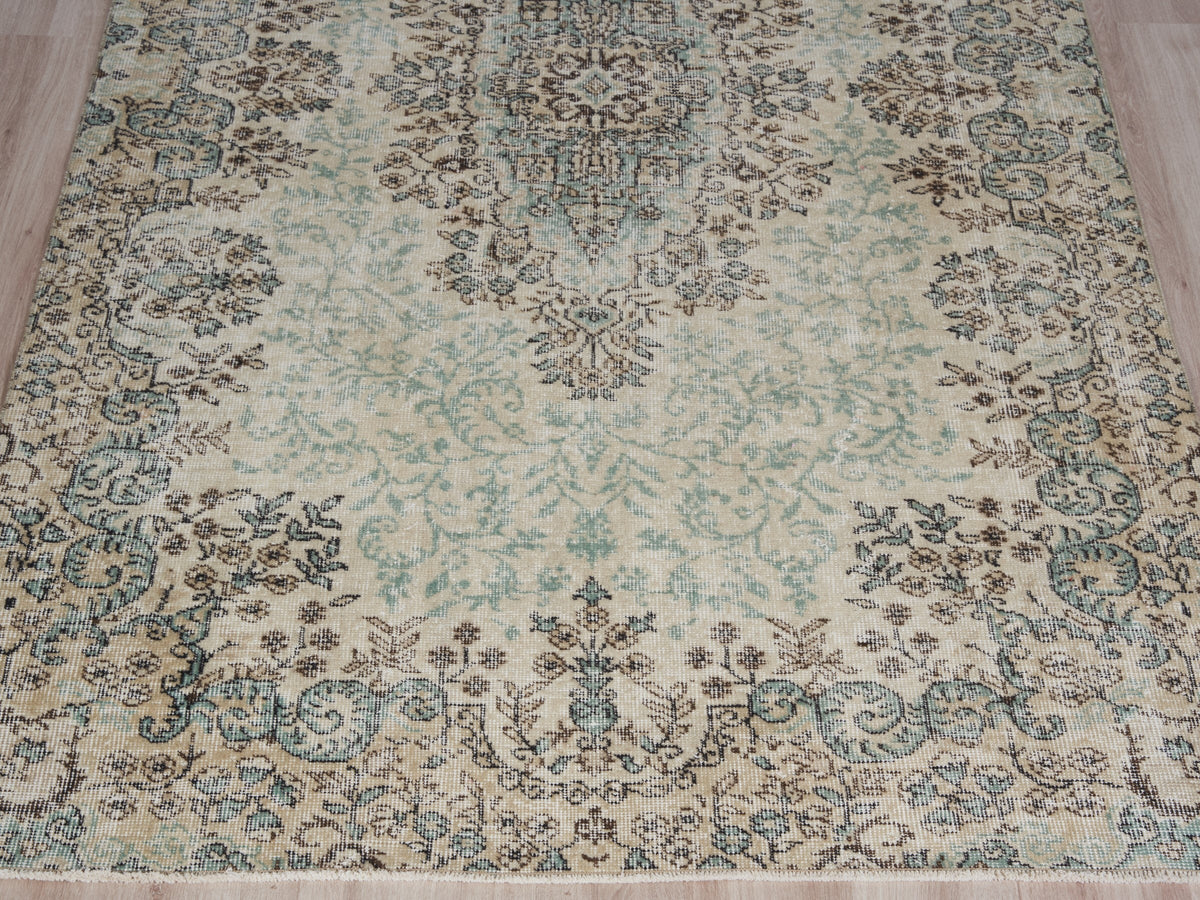 5'5" x 9'5" Neutral Vintage Turkish Area Rug